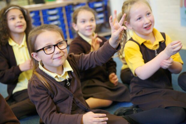 Primary school children in class