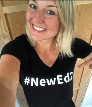 Emma Turner wearing a t shirt that says #NewEd2