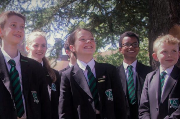 A group of students standing outside