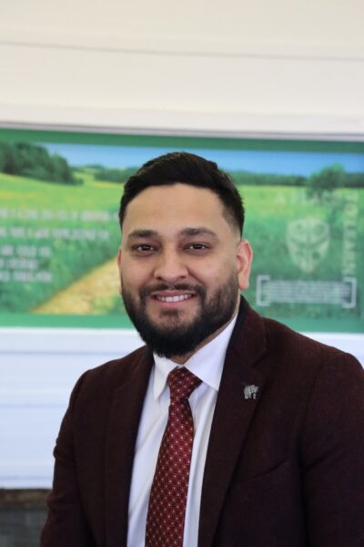 A man smiling at the camera