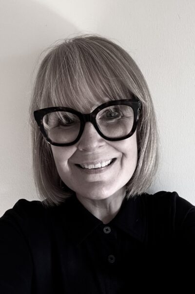 A woman smiling at the camera